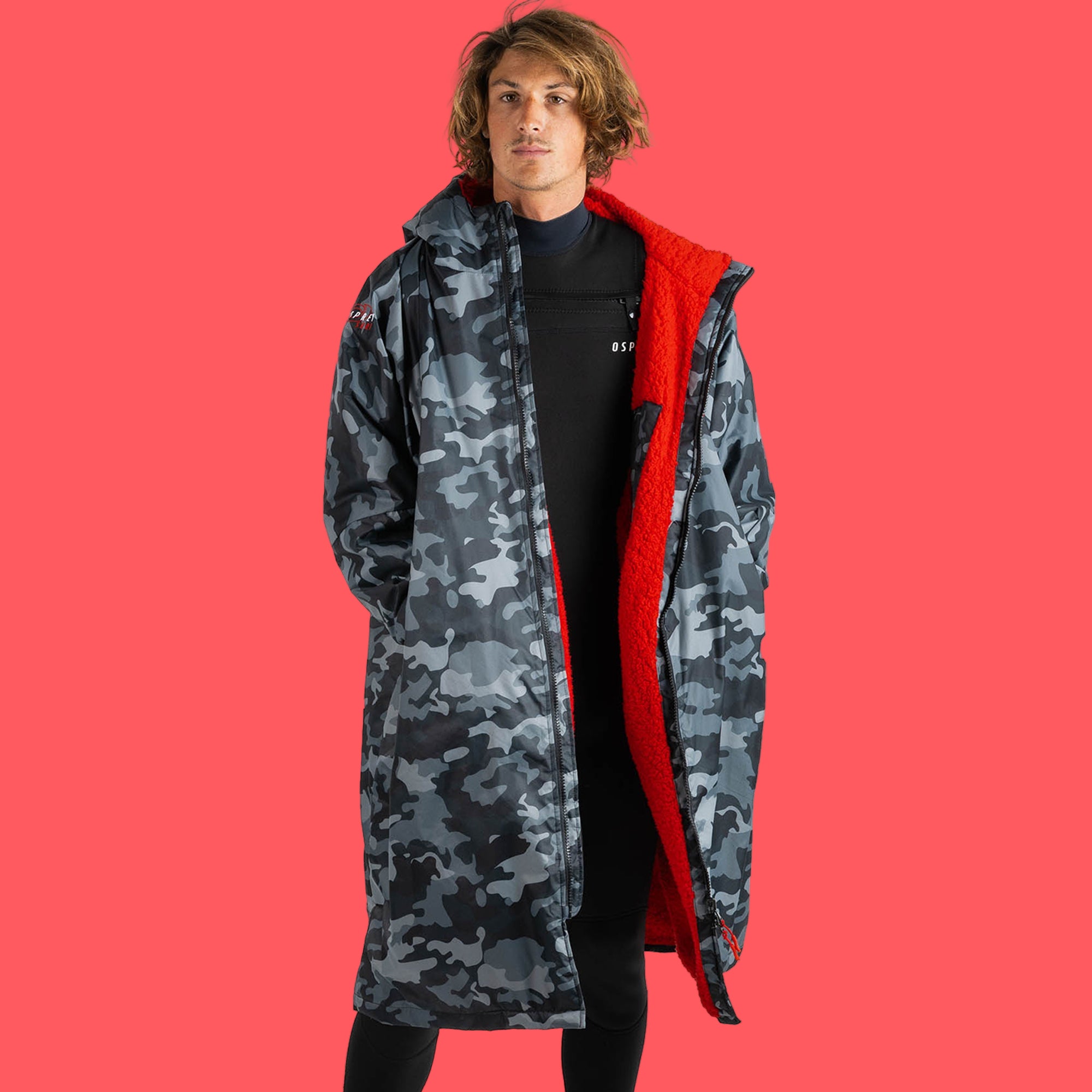 Male model earing camo changing robe with red sherpa fleece lining