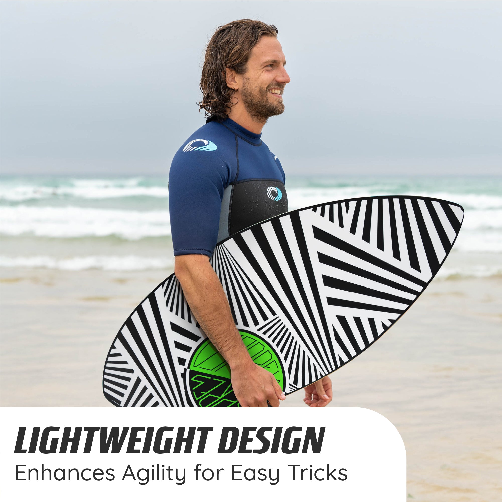 surfer holding the osprey skimboard on a uk beach with shallow waves